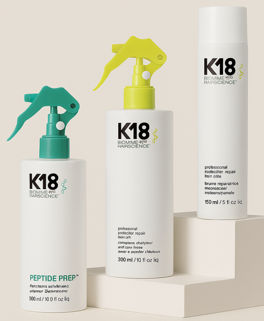 HOLDENGRACE stylist applying K18 Professional Mist during a blonding service at our Toronto salon — protecting and repairing hair at the molecular level.