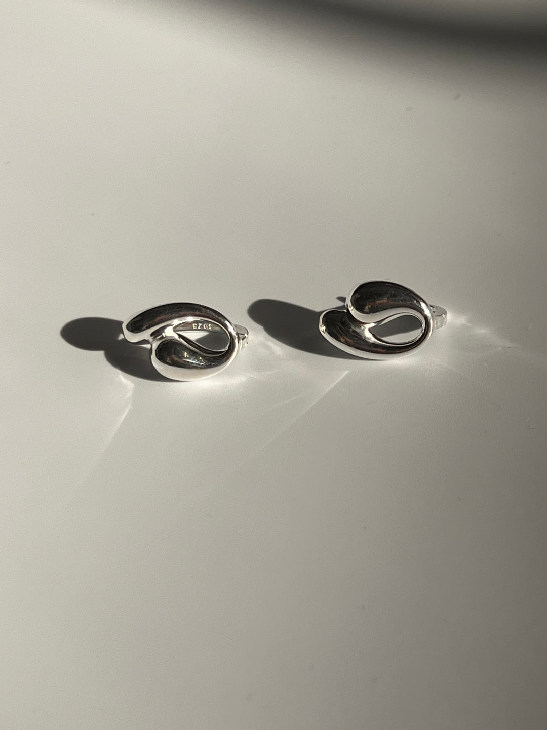 Frances Grace Silver Swirl Huggie Earrings