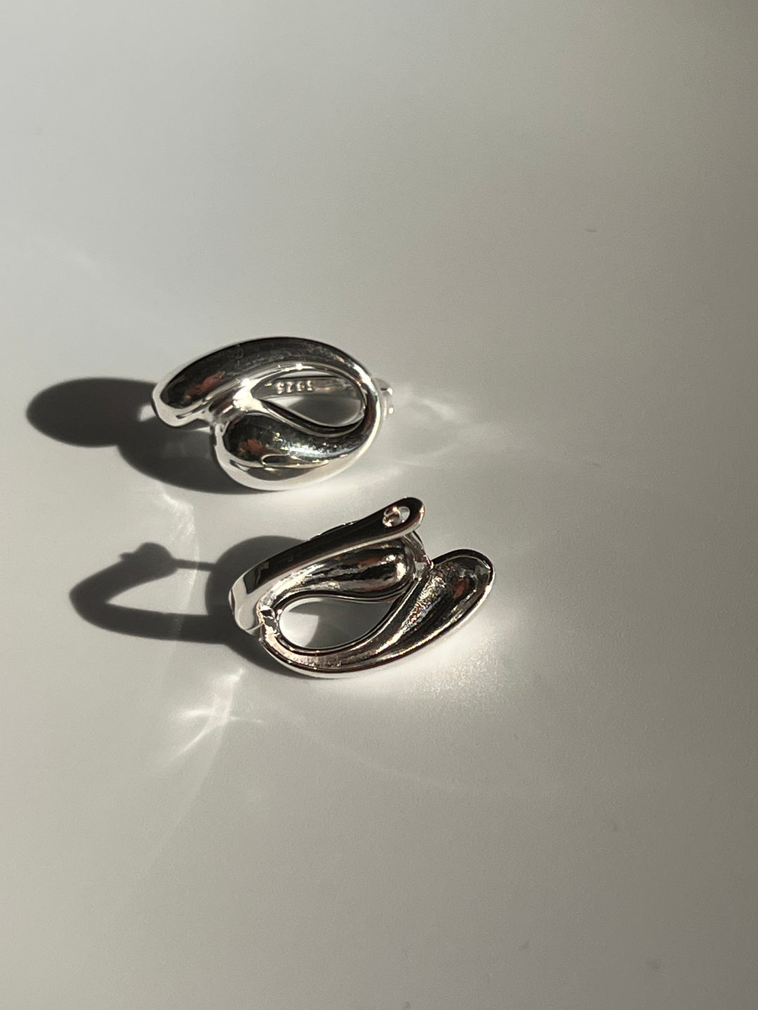 Frances Grace Silver Swirl Huggie Earrings